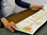 Photo of a paper growth chart spread out on a table top