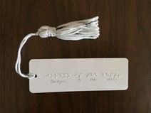 Bookmark with "Jordyn is the best" in print and braille
