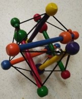 Toy made of wooden dowels joined by elastic cords