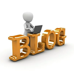 White figure standing against the word BLOG in block letters. They are typing on a laptop